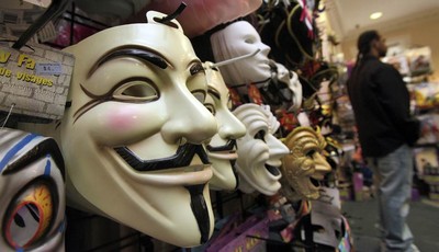 
              FILE - In this Oct. 21, 2011 file photo, masks, including "V for Vendetta," left, are displayed at a Ricky